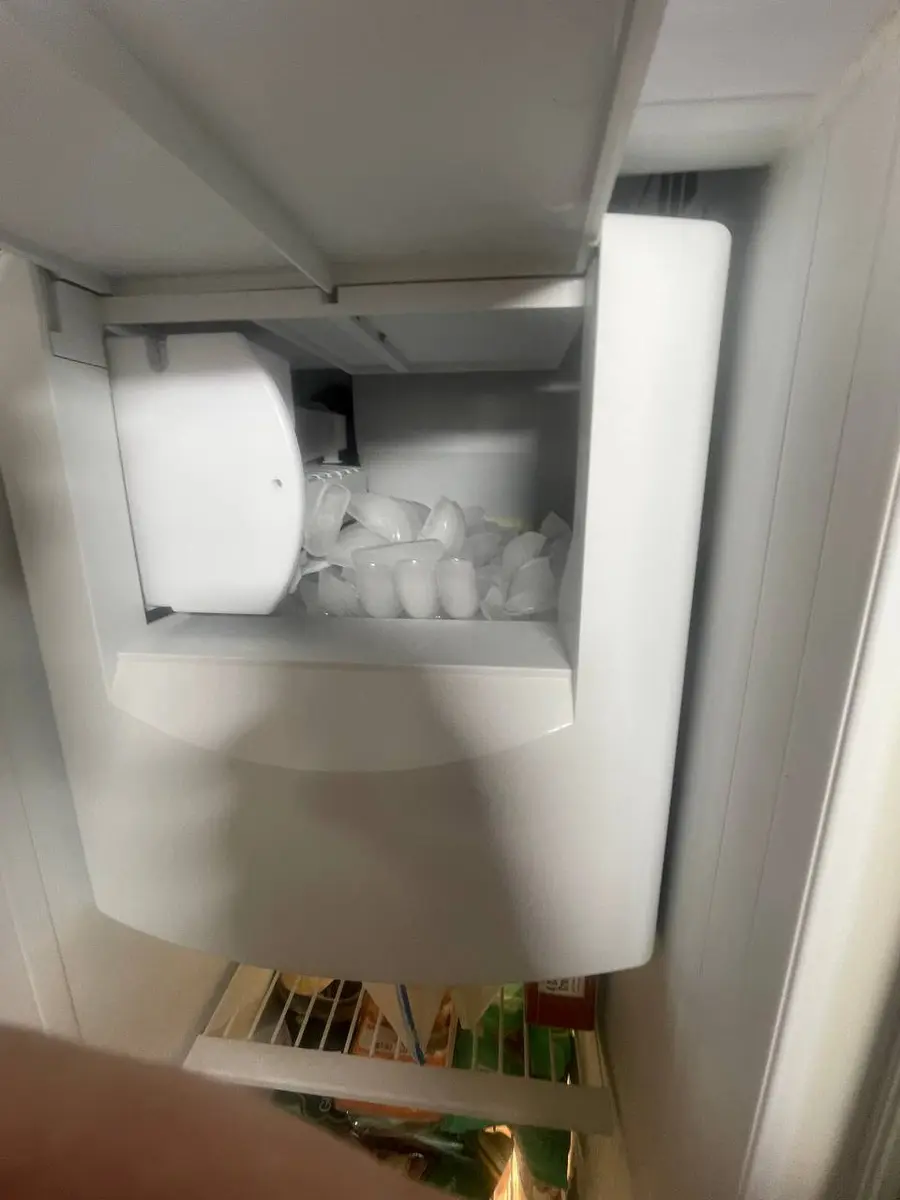 GE Monogram ice maker unit during repair — EasyBear technician service