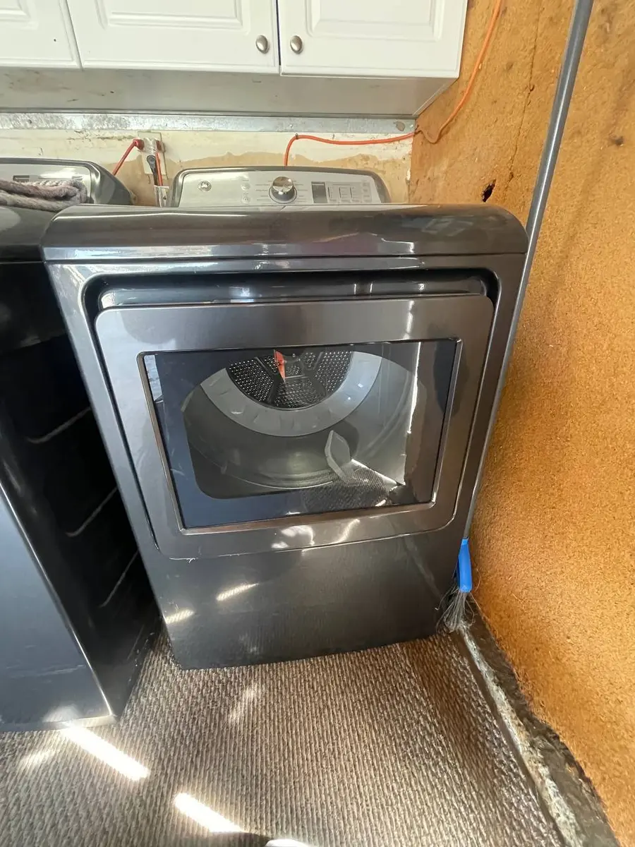 Front-load dryer with dark finish in home laundry room — EasyBear repair
