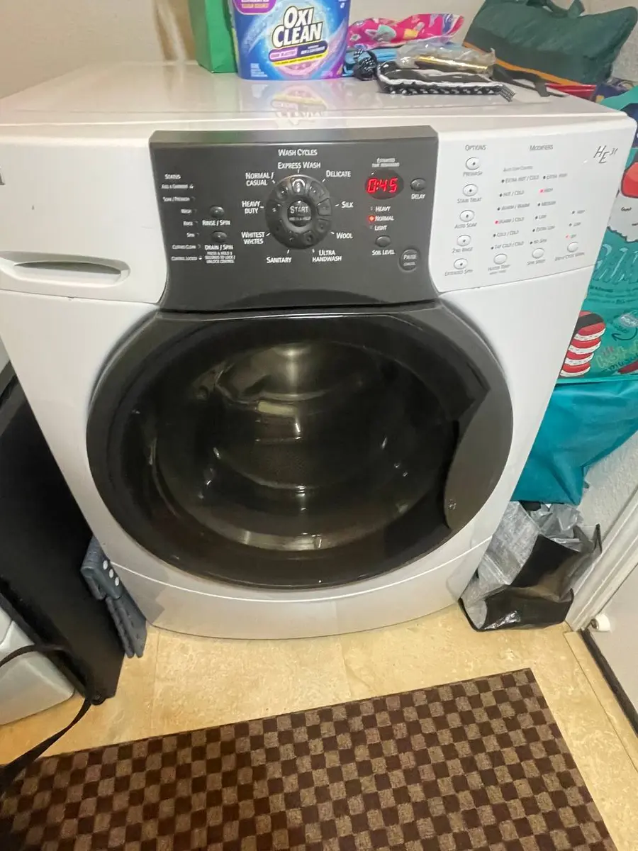 Kenmore front-load washer side angle in home laundry — EasyBear service