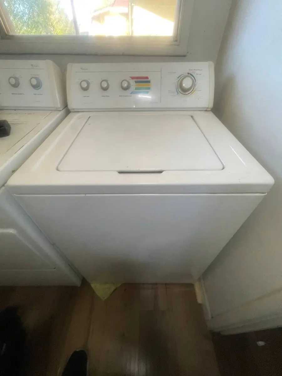 Whirlpool top-load washer in customer laundry area — EasyBear repair service